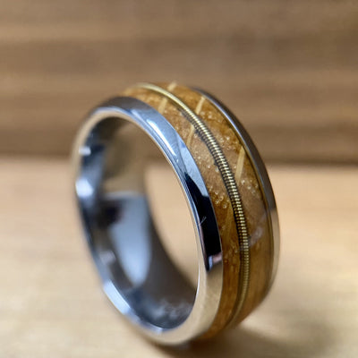 “The Guitar Player” Tungsten Ring With Reclaimed Whiskey Barrel And Guitar String BW James Jewelers 