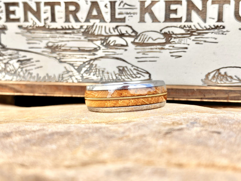 “ The Guitar Player” Tungsten Ring With Reclaimed Whiskey Barrel And Guitar String BW James Jewelers 