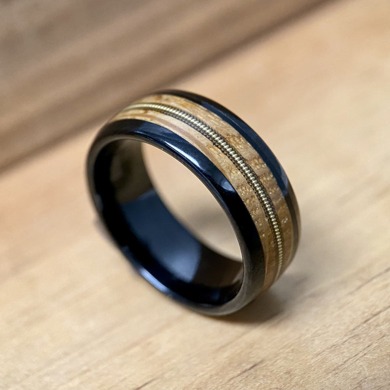 “The Bluegrass Guitar Player” Kentucky Bourbon Whiskey Barrel Black Ceramic Ring With Guitar String ALT Wedding Band BW James Jewelers 