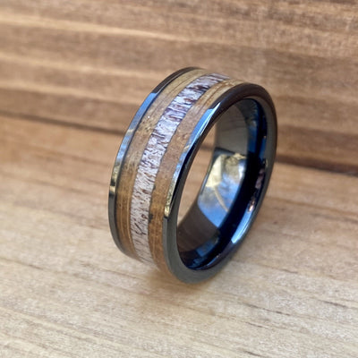 "The Outdoorsman" Black Ceramic Ring With Deer Antler and Reclaimed Whiskey Barrel Wood ALT Wedding Band BW James Jewelers 